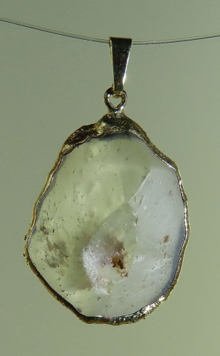 Pendants of Libyan Desert Silica Glass with gold-plated edge