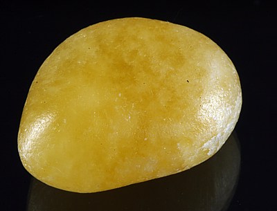 Orangencalcit, handpoliert
