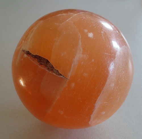 Fibrolithic Selenite, orange sphere