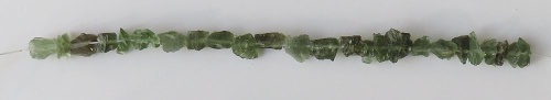 String of drilled Moldavites