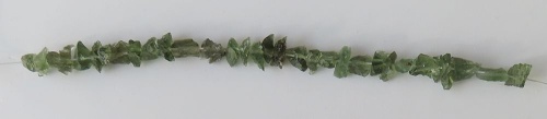 String of drilled Moldavites